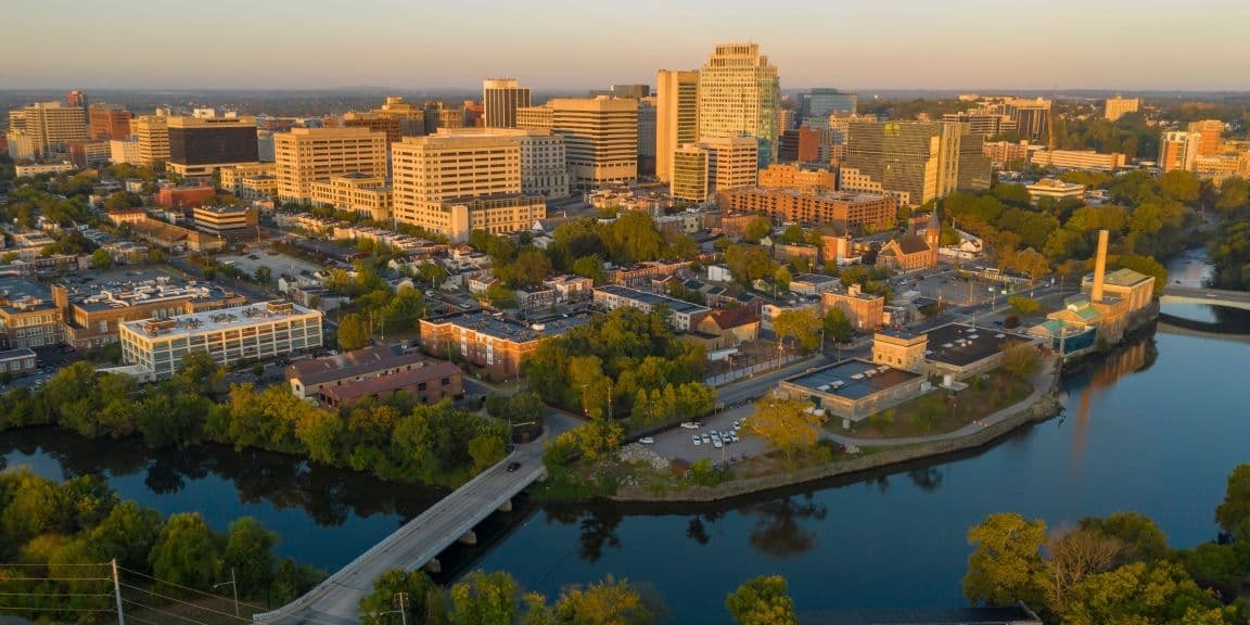 Aerial view of a city in Delaware with buildings and greenery
