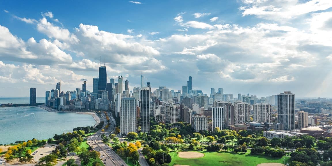 View of the city and beach with a blue sky