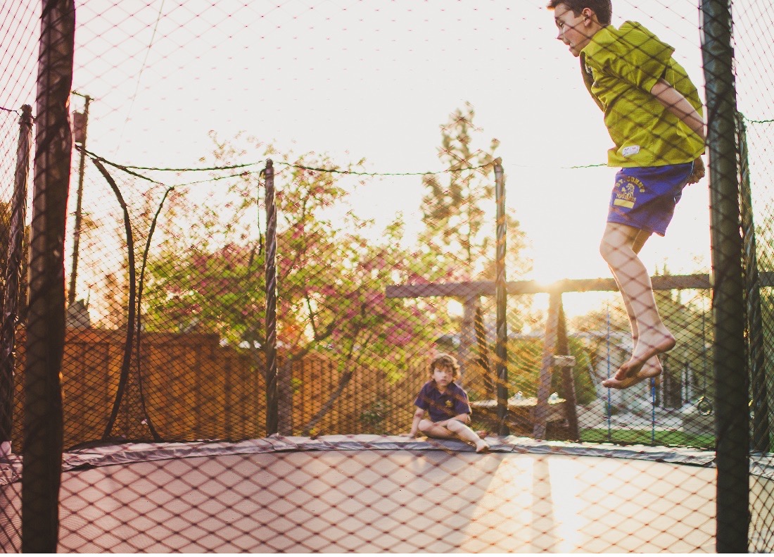 Children jumping on a trampoline